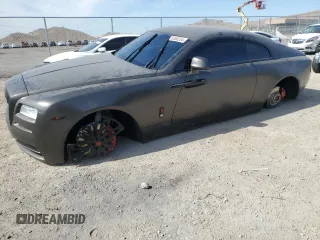 2014 Rolls-Royce Wraith z VIN SCA665C57EUX84259, wystawiony jako Copart lot #65586204 z przebiegiem 52 048 mil mil oraz Szkody całkowita. Historia ofert i sprzedaży dostępna na DreamBid. Obrazek 1.