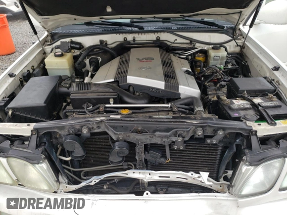 2004 Lexus LX 470 with VIN JTJHT00W343547828, listed as a Copart auction lot 48982045 with 196,877 mi miles and Salvage Title. Bid and sale history available at DreamBid. Image 12.