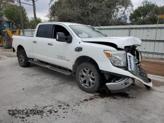 2017 Nissan Titan XD SL with VIN 1N6BA1F26HN520459, listed as a Copart auction lot 79275354 with 180,118 mi miles and Salvage Title. Bid and sale history available at carsss.com. Image 4.