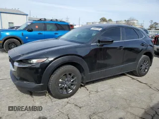 2021 Mazda CX-30 2.5 S with VIN 3MVDMAAL8MM303999, listed as a Copart auction lot 45655205 with 60,210 mi miles and Salvage Title. Bid and sale history available at carsss.com. Image 1.