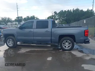 2015 Chevrolet Silverado 1500 LT with VIN 3GCUKREC8FG535021, listed as a IAAI auction lot 42154626 with 125,897 mi miles and . Bid and sale history available at DreamBid. Image 14.