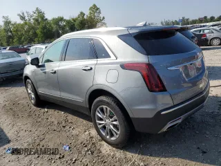 2023 Cadillac XT5 AWD Premium Luxury with VIN 1GYKNDR40PZ152982, listed as a Copart auction lot 69569914 with 24,829 mi miles and Salvage Title. Bid and sale history available at DreamBid. Image 2.