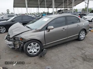 2006 Honda Civic LX with VIN 2HGFA16586H507296, listed as a IAAI auction lot 42101001 with 144,781 mi miles and . Bid and sale history available at DreamBid. Image 18.