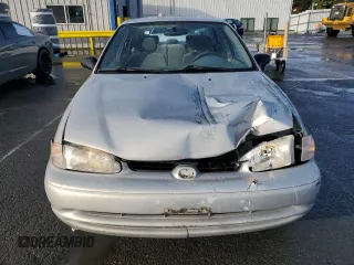 2002 Chevrolet Prizm z VIN 1Y1SK52842Z404089, wystawiony jako Copart lot #49103545 z przebiegiem 134 794 mil mil oraz Szkoda całkowita • Salvage title. Historia ofert i sprzedaży dostępna na DreamBid. Obrazek 5.