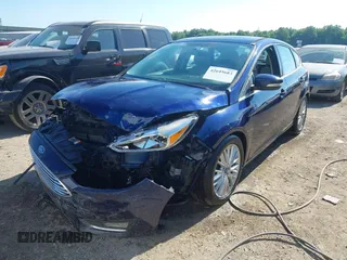 2016 Ford Focus Titanium with VIN 1FADP3N23GL231613, listed as a IAAI auction lot 42645683 with 76,072 mi miles and . Bid and sale history available at DreamBid. Image 18.