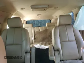 2013 Chevrolet Suburban LT with VIN 1GNSKJE74DR239851, listed as a Copart auction lot 44856425 with 203,074 mi miles and Salvage Title. Bid and sale history available at DreamBid. Image 10.
