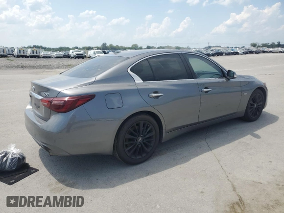 2019 Infiniti Q50 Luxe with VIN JN1EV7AP7KM516284, listed as a Copart auction lot 61647345 with 71,217 mi miles and Salvage title. Bid and sale history available at DreamBid. Image 3.