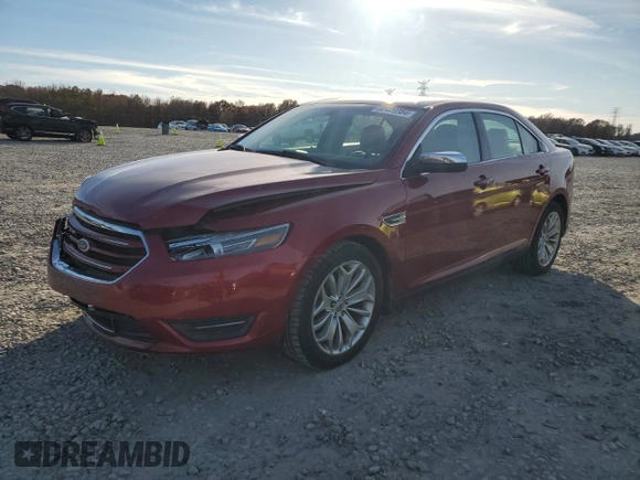 2014 Ford Taurus Limited with VIN 1FAHP2F81EG183128, listed as a Copart auction lot 82409384 with 107,624 mi miles and Salvage title. Bid and sale history available at DreamBid. Image 1.