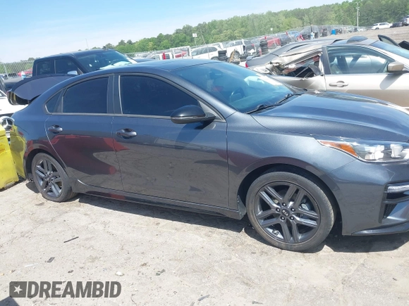 2021 Kia Forte GT-Line z VIN 3KPF34AD2ME341973, wystawiony jako IAAI lot #42084462 z przebiegiem 61 542 mil mil oraz . Historia ofert i sprzedaży dostępna na DreamBid. Obrazek 13.