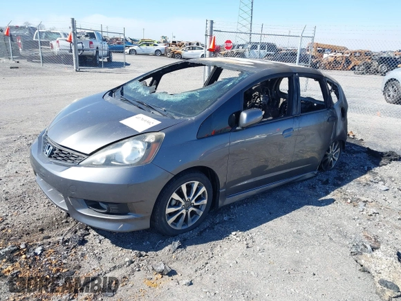 2013 Honda Fit Sport with VIN JHMGE8H52DC080175, listed as a IAAI auction lot 41769302 with 1 mi miles. Bid and sale history available at carsss.com. Image 2.
