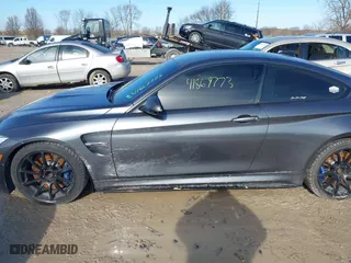 2015 BMW M4 with VIN WBS3R9C57FK334921, listed as a IAAI auction lot 41869773 with 107,058 mi miles. Bid and sale history available at carsss.com. Image 20.