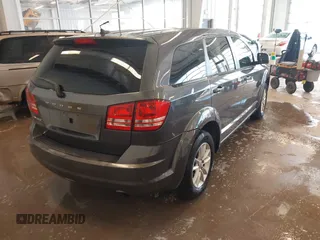 2014 Dodge Journey American Value Pkg with VIN 3C4PDCAB1ET153064, listed as a IAAI auction lot 41254848 with 179,905 mi miles. Bid and sale history available at carsss.com. Image 4.