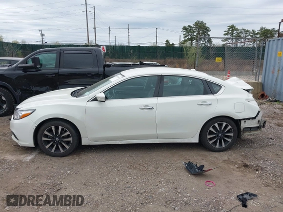 2018 Nissan Altima SR with VIN 1N4AL3AP7JC174856, listed as a IAAI auction lot 42070366 with 135,680 mi miles and . Bid and sale history available at carsss.com. Image 14.
