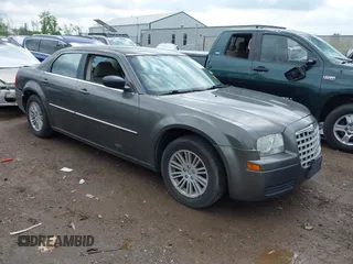 2009 Chrysler 300 LX with VIN 2C3KA43D49H558006, listed as a IAAI auction lot 42178195 with 208,864 mi miles and . Bid and sale history available at carsss.com. Image 1.