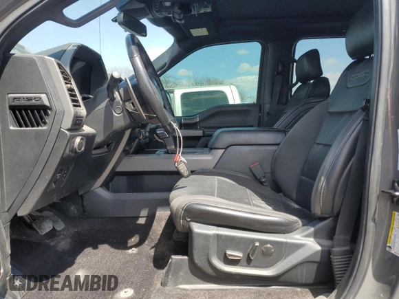 2020 Ford F-150 Raptor with VIN 1FTFW1RG3LFC73188, listed as a Copart auction lot 52573455 with 99,198 mi miles and Salvage Title. Bid and sale history available at carsss.com. Image 7.