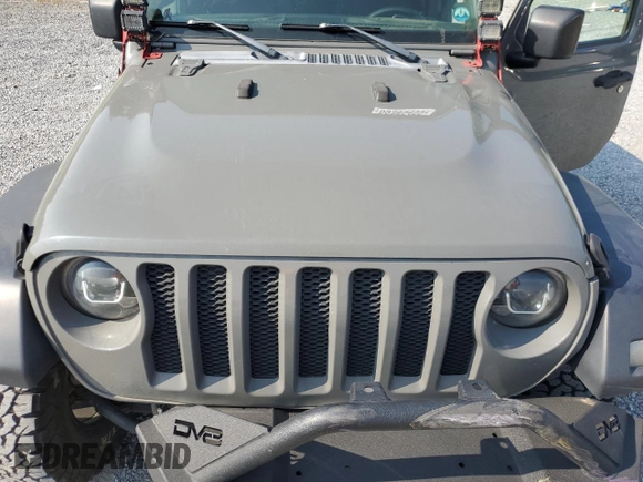 2020 Jeep Wrangler Sport with VIN 1C4GJXAG4LW189950, listed as a Copart auction lot 59385455 with 125,848 mi miles and Salvage title. Bid and sale history available at DreamBid. Image 11.