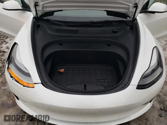 2022 Tesla Model 3 z VIN 5YJ3E1EAXNF118748, wystawiony jako Copart lot #43690075 z przebiegiem 52 494 mil mil oraz Szkoda całkowita • Salvage title. Historia ofert i sprzedaży dostępna na DreamBid. Obrazek 13.