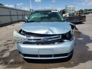 2009 Ford Focus SE z VIN 1FAHP35N49W186131, wystawiony jako Copart lot #57279205 z przebiegiem 85 285 mil mil oraz Szkoda całkowita • Salvage title. Historia ofert i sprzedaży dostępna na DreamBid. Obrazek 5.
