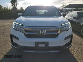 2020 Honda Pilot Touring 7-Passenger z VIN 5FNYF6H68LB002405, wystawiony jako Copart lot #46857625 z przebiegiem 69 617 mil mil oraz Szkoda całkowita • Salvage title. Historia ofert i sprzedaży dostępna na DreamBid. Obrazek 5.