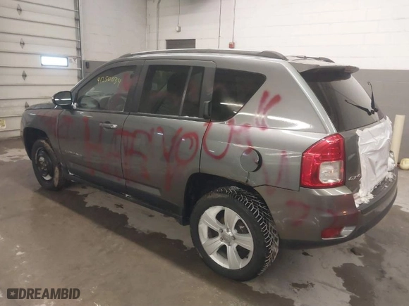 2012 Jeep Compass Latitude with VIN 1C4NJDEB8CD655864, listed as a IAAI auction lot 41250034 with 121,509 mi miles. Bid and sale history available at carsss.com. Image 3.
