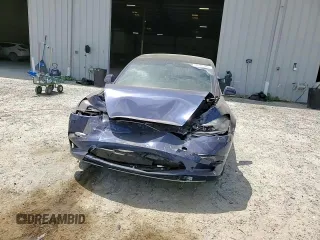 2023 Tesla Model 3 Performance z VIN 5YJ3E1EC4PF558646, wystawiony jako Copart lot #55201985 z przebiegiem 24 455 mil mil oraz Nie do naprawy • Non repairable. Historia ofert i sprzedaży dostępna na DreamBid. Obrazek 14.