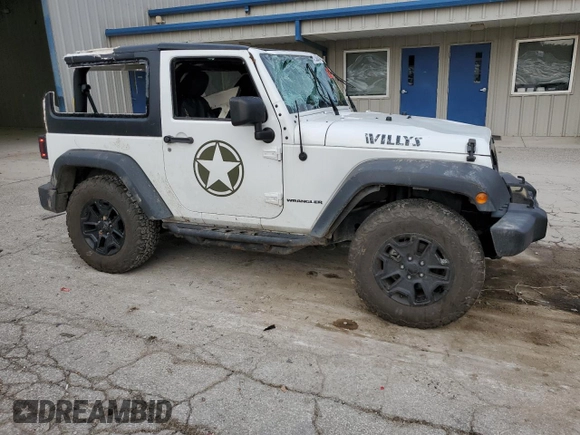 2017 Jeep Wrangler Willys Wheeler with VIN 1C4AJWAG7HL589574, listed as a Copart auction lot 79006504 with 117,075 mi miles and Salvage Title. Bid and sale history available at DreamBid. Image 4.