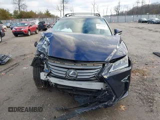 2017 Lexus RX with VIN 2T2BZMCAXHC063422, listed as a IAAI auction lot 41130585 with 63,883 mi miles. Bid and sale history available at carsss.com. Image 12.