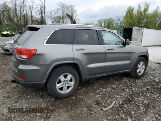 2011 Jeep Grand Cherokee Laredo with VIN 1J4RR4GG7BC578129, listed as a Copart auction lot 53147775 with 157,127 mi miles and Salvage title. Bid and sale history available at DreamBid. Image 3.