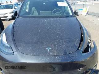2024 Tesla Model Y Long Range with VIN 7SAYGDEE4RF149457, listed as a IAAI auction lot 41700922 with Not Provided miles. Bid and sale history available at carsss.com. Image 10.