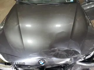2016 BMW 3 Series 328i xDrive with VIN WBA8E3C59GK502613, listed as a Copart auction lot 63661805 with 127,559 mi miles and Salvage title. Bid and sale history available at DreamBid. Image 11.