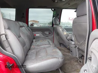 1998 GMC Yukon with VIN 1GKEK13R0WJ703105, listed as a IAAI auction lot 41980869 with 302,546 mi miles. Bid and sale history available at carsss.com. Image 8.
