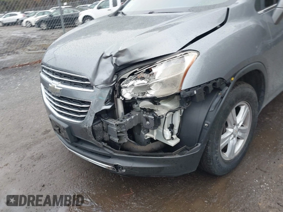 2015 Chevrolet Trax LT with VIN KL7CJRSBXFB097960, listed as a IAAI auction lot 41976883 with 98,621 mi miles and . Bid and sale history available at carsss.com. Image 6.