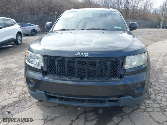 2011 Jeep Grand Cherokee Laredo with VIN 1J4RR4GG7BC721483, listed as a IAAI auction lot 41810180 with 181,558 mi miles. Bid and sale history available at carsss.com. Image 6.