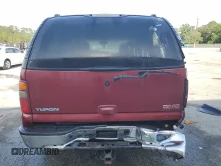 2003 GMC Yukon SLT z VIN 1GKEC13Z63J308578, wystawiony jako Copart lot #53270405 z przebiegiem 308 272 mil mil oraz Szkody całkowita. Historia ofert i sprzedaży dostępna na DreamBid. Obrazek 6.