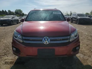 2014 Volkswagen Tiguan SE with VIN WVGAV3AX9EW038118, listed as a Copart auction lot 56329625 with 134,620 mi miles and Salvage title. Bid and sale history available at DreamBid. Image 5.