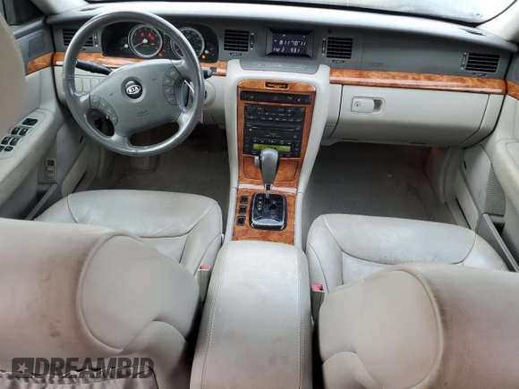 2005 Kia Amanti z VIN KNALD124055055725, wystawiony jako Copart lot #73573754 z przebiegiem 105 665 mil mil oraz Tytuł czysty. Historia ofert i sprzedaży dostępna na DreamBid. Obrazek 8.