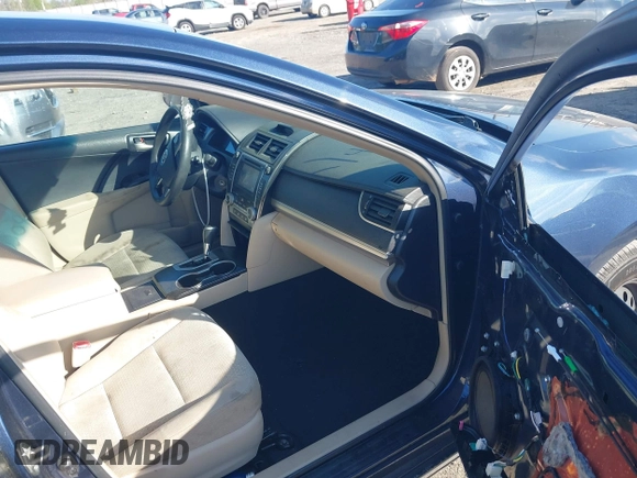 2014 Toyota Camry L with VIN 4T1BF1FK3EU820882, listed as a IAAI auction lot 42012278 with 174,000 mi miles and . Bid and sale history available at DreamBid. Image 5.