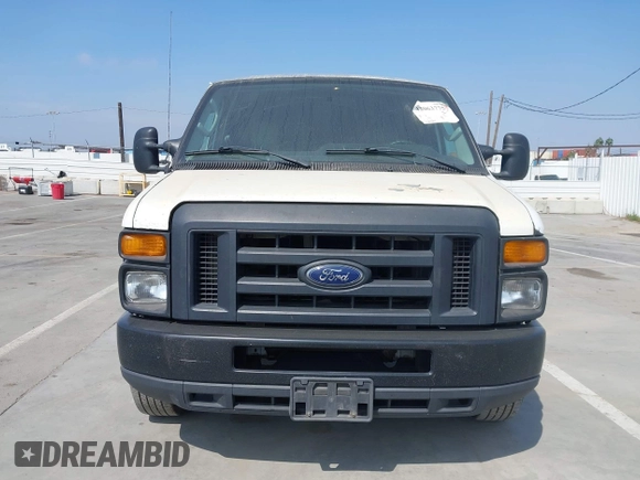 2014 Ford Econoline Cargo Commercial with VIN 1FTNE1EW4EDA90117, listed as a IAAI auction lot 42063775 with 276,021 mi miles and . Bid and sale history available at DreamBid. Image 12.