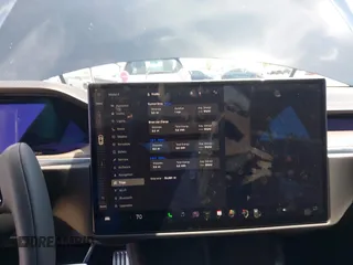2022 Tesla Model S with VIN 5YJSA1E51NF464231, listed as a IAAI auction lot 42077838 with 53,290 mi miles and . Bid and sale history available at DreamBid. Image 19.