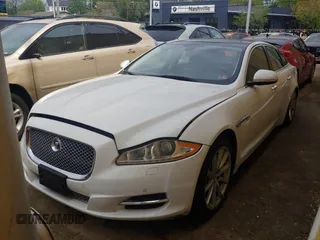 2013 Jaguar XJ with VIN SAJWJ1CD7D8V49599, listed as a Copart auction lot 54008915 with 133,163 mi miles and Clean Title. Bid and sale history available at DreamBid. Image 2.