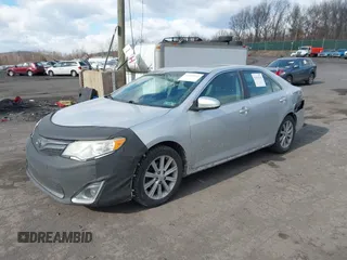 2014 Toyota Camry L with VIN 4T4BF1FK8ER387050, listed as a IAAI auction lot 41453516 with 184,150 mi miles. Bid and sale history available at carsss.com. Image 2.