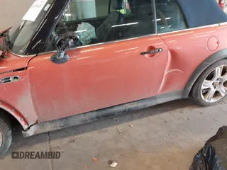2005 MINI Convertible S with VIN WMWRH33455TK55035, listed as a IAAI auction lot 41936645 with 111,018 mi miles and . Bid and sale history available at DreamBid. Image 13.