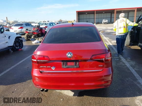 2017 Volkswagen Jetta SEL z VIN 3VWL17AJ5HM245831, wystawiony jako IAAI lot #41128163 z przebiegiem 149 248 mil mil oraz . Historia ofert i sprzedaży dostępna na DreamBid. Obrazek 17.