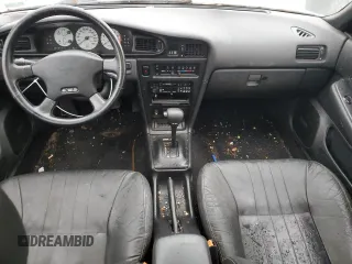 1990 Nissan Maxima z VIN JN1HJ01P4LT450350, wystawiony jako Copart lot #45054615 z przebiegiem 225 239 mil mil oraz Tytuł czysty. Historia ofert i sprzedaży dostępna na DreamBid. Obrazek 8.
