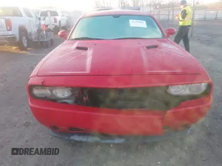 2011 Dodge Challenger z VIN 2B3CJ4DGXBH561850, wystawiony jako IAAI lot #41139802 z przebiegiem 155 948 mil mil oraz . Historia ofert i sprzedaży dostępna na DreamBid. Obrazek 12.
