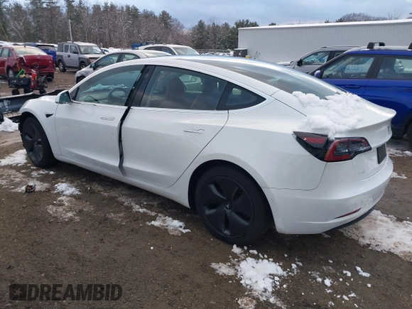 2020 Tesla Model 3 Long Range with VIN 5YJ3E1EB6LF784169, listed as a IAAI auction lot 40957226 with 96,415 mi miles. Bid and sale history available at carsss.com. Image 3.