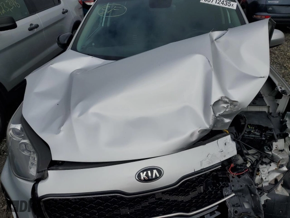 2018 Kia Sportage LX z VIN KNDPMCAC4J7446934, wystawiony jako Copart lot #53712435 z przebiegiem 72 974 mil mil oraz Szkoda całkowita • Salvage title. Historia ofert i sprzedaży dostępna na DreamBid. Obrazek 12.