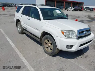 2006 Toyota 4Runner SR5 with VIN JTEBU14R768064604, listed as a IAAI auction lot 42059877 with 166,548 mi miles. Bid and sale history available at carsss.com. Image 1.