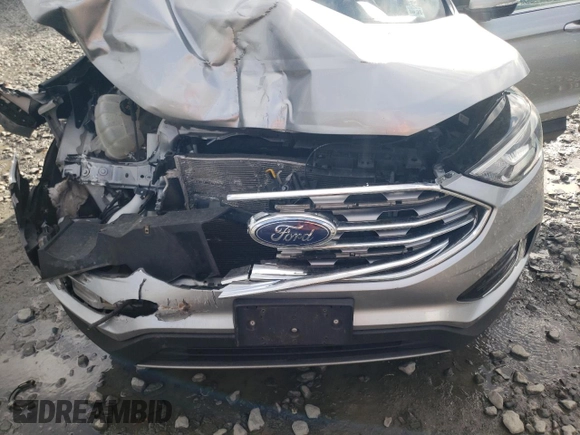 2020 Ford Edge SEL z VIN 2FMPK4J95LBA29912, wystawiony jako Copart lot #82968534 z przebiegiem 104 083 mil mil oraz Szkoda całkowita • Salvage title. Historia ofert i sprzedaży dostępna na DreamBid. Obrazek 14.