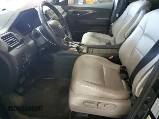 2020 Honda Passport EX-L with VIN 5FNYF8H57LB011549, listed as a Copart auction lot 59123735 with 127,797 mi miles and Salvage title. Bid and sale history available at DreamBid. Image 7.